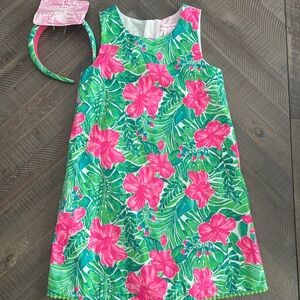 Tommy Bahama Pink and White Clothing Tag